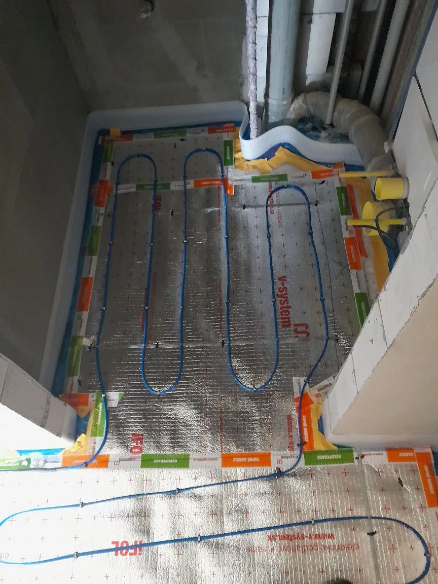 Rekonstrukce bytu Štěpánov - podlahové topení — foto 10